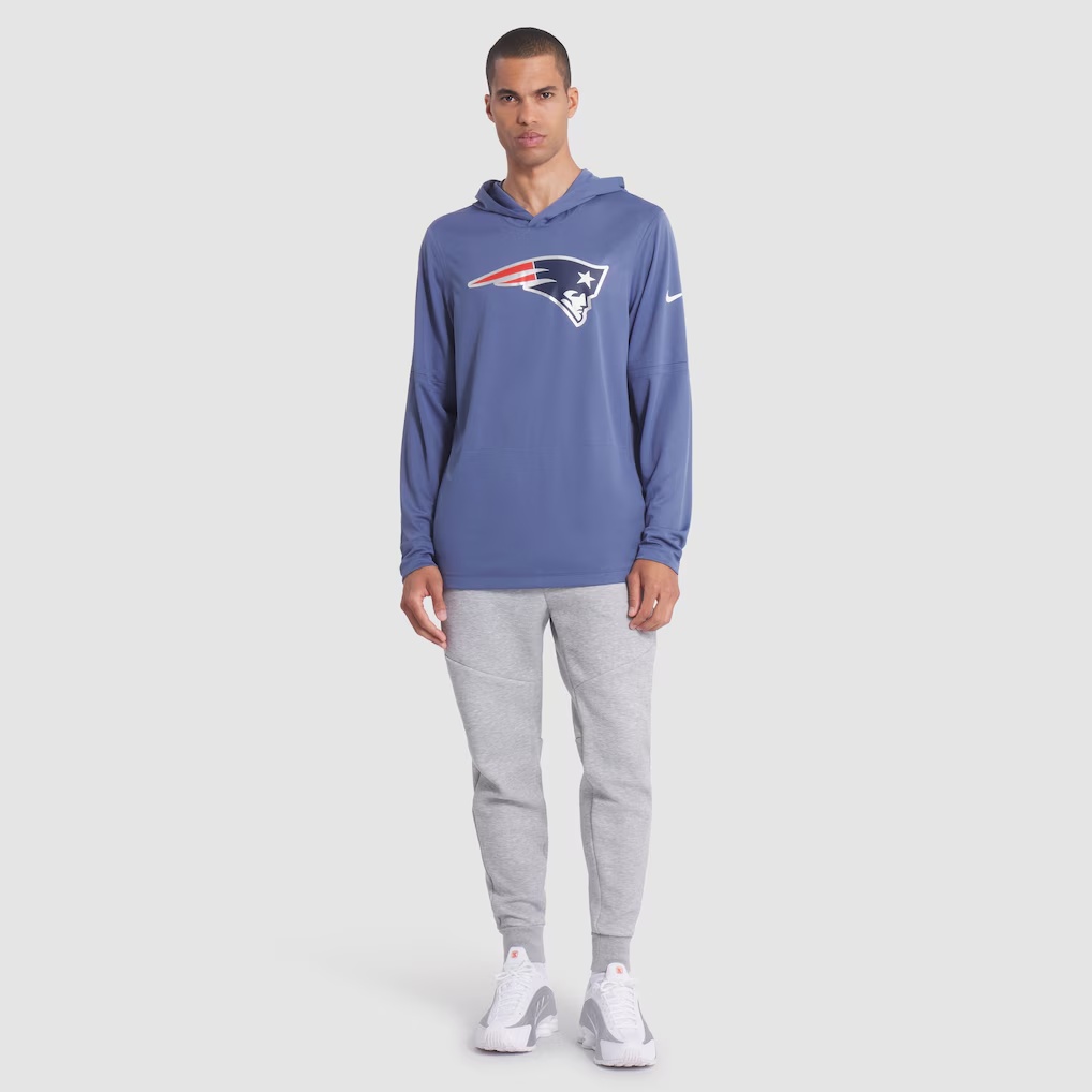 4607-New-England-Patriots-Nike-2025-Rivalries-Collection-Sideline-Dri-FIT-Long-Sleeve-Hoodie-T-Shirt-Storm-Blue-3.jpg New England Patriots Nike 2025 Rivalries Collection Sideline Dri-FIT Long Sleeve Hoodie T-Shirt - Storm Blue